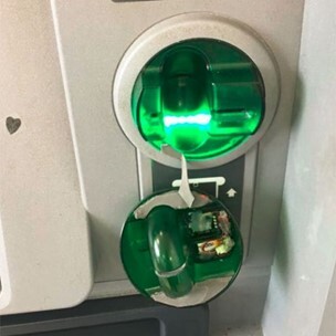 A credit card skimmer that has been removed from a gas pump payment terminal